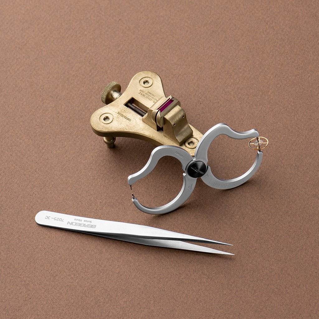 Tweezer, figure-of-eight caliper, sprung balance, poising-toot; all the key utensils for a perfect balance recipe. 

#AteliersdeMonaco #PoinconDeGeneve #GenevaSeal #Watchmaking #Craftsmanship #Balancier #Brucelle #dMc #Master #Watchmaker #Horology #Decoration #HandFinishing