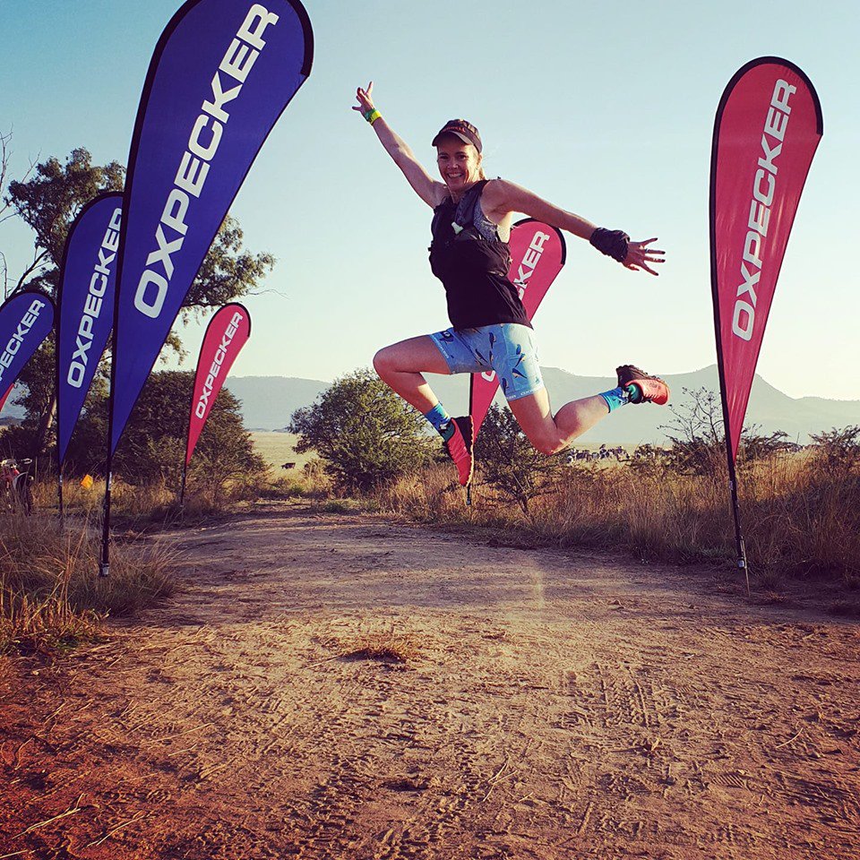 TRAILza's tweet photo. What did you do with your #trailrunning weekend? Share your #TrailTrophy photo memories! Be sure to include a pic caption. Here Desiree Du Trevous jumps for joy at @Runtheoxpecker! #TrailTrophies https://t.co/DxzIqRMdrP