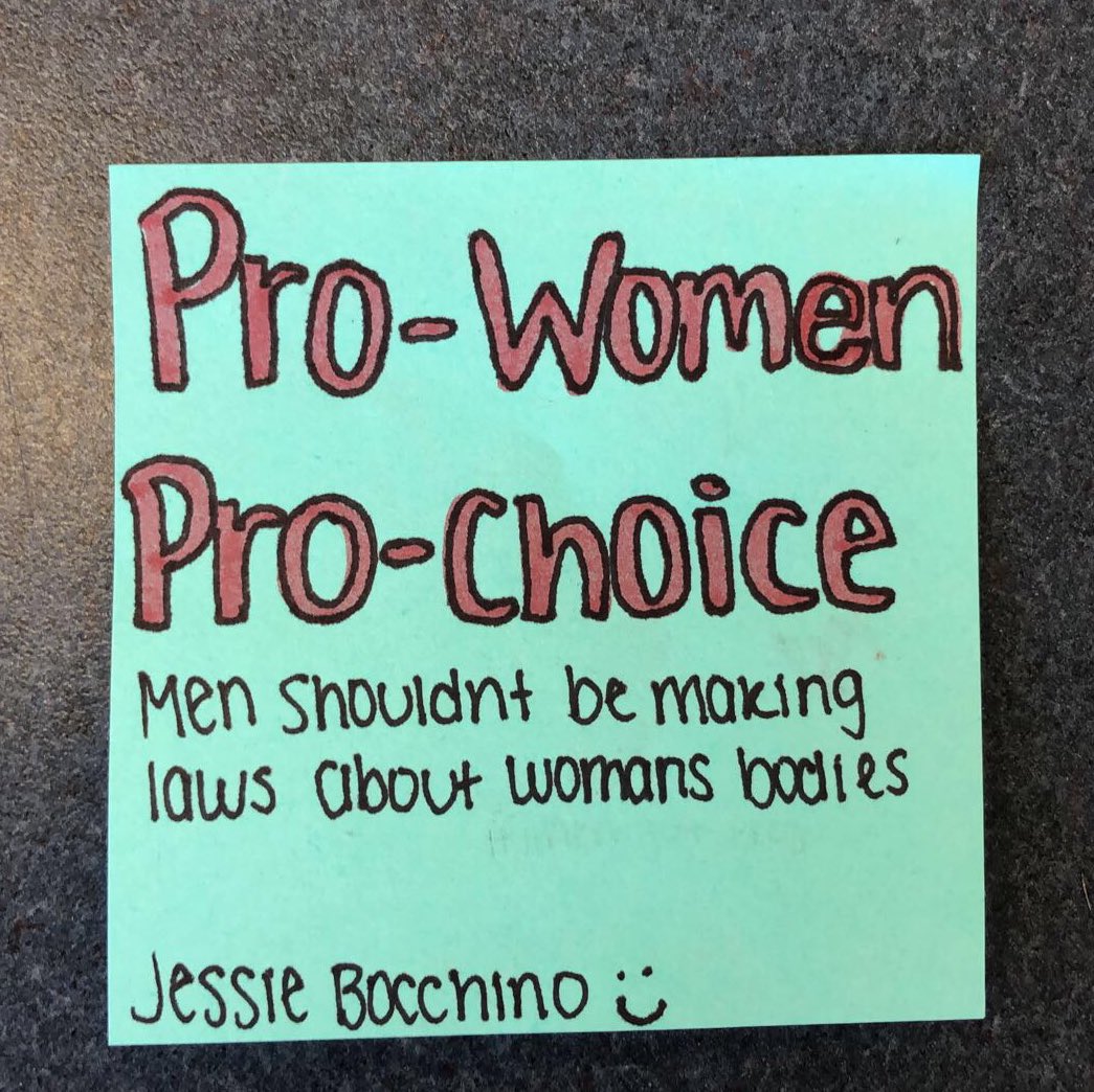 bocchino_jessie's tweet photo. my school is encouraging students to buy a sticky note and write or draw something on it to create a school Mural. Mine was taken down because it was “too politcal for student” because they don’t want other students thinking it okay to voice their opinions. Twitter do ur thing! https://t.co/4KG0xwTIKV