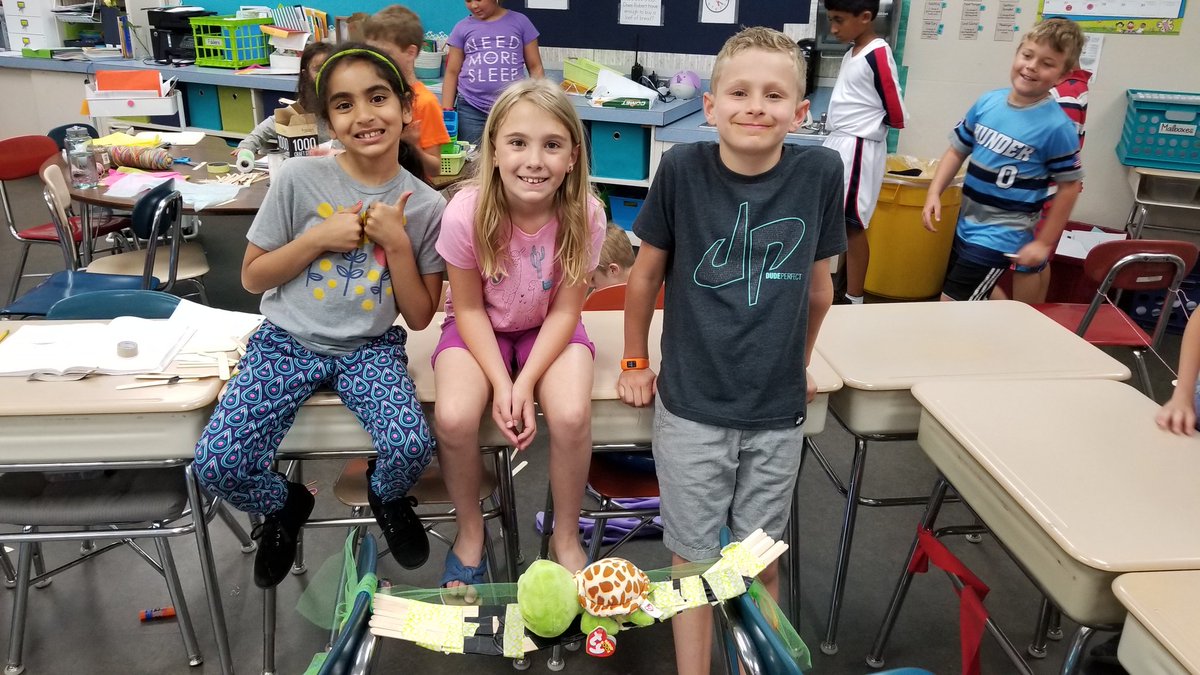 We read "Iggy Peck Architect" and designed bridges to help our turtle cross between chairs. The first time, every bridge failed, but students persevered and redesigned resulting in 5 successful bridges the second time!