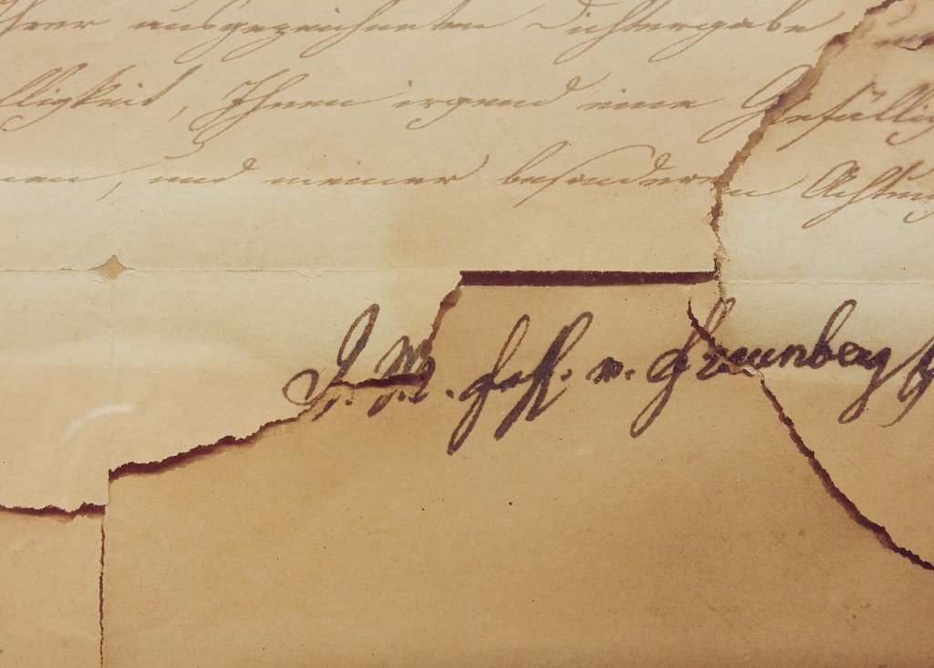 DrMartinPracher's tweet image. A 19th ct. letter with damages due to bad framing. Taped together and mounted with acidic carton. Exhibit for today&apos;s #PreventiveConservation and #TechnicalArtHistory class.