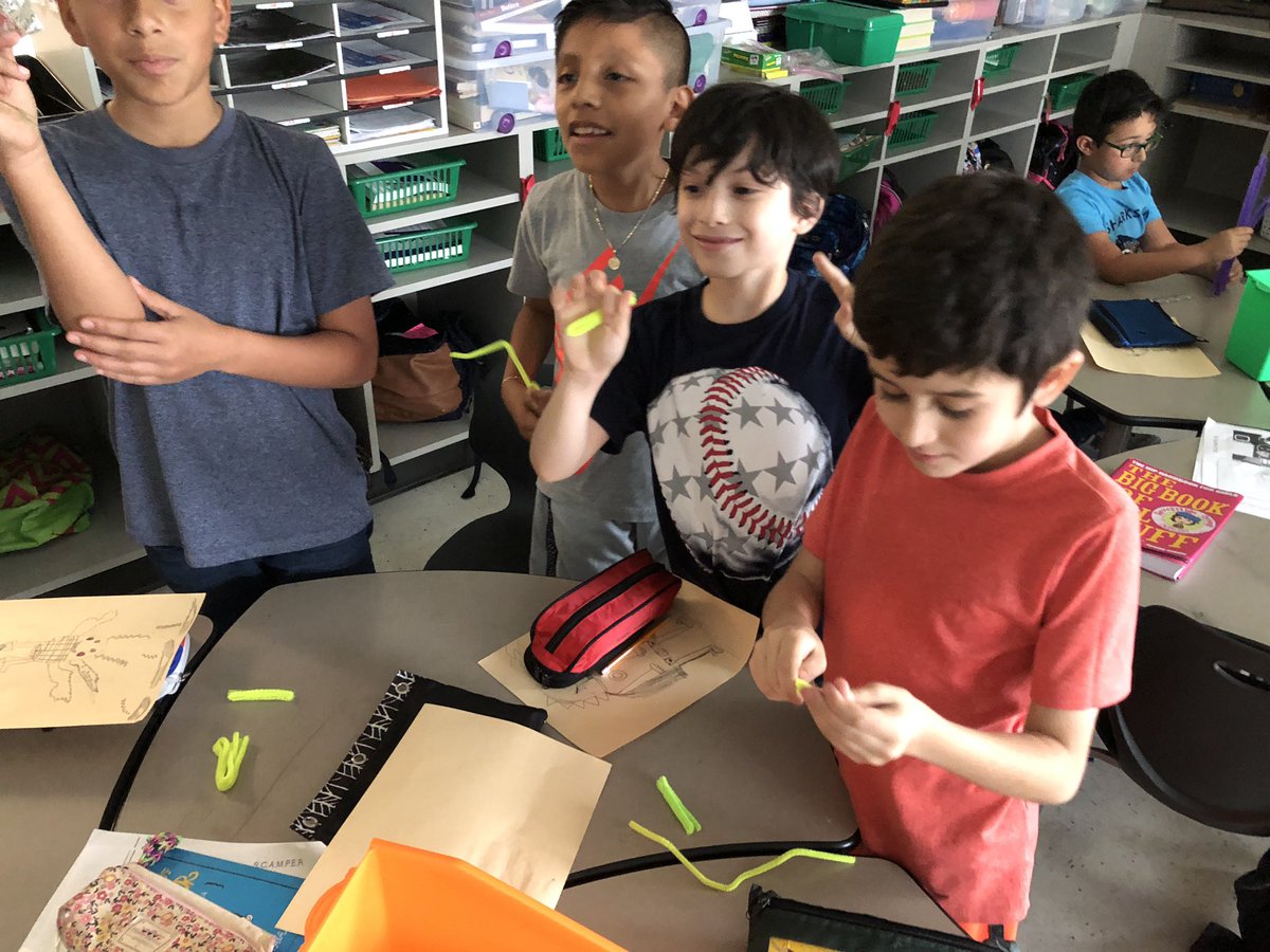 Thinkapalooza! Creating a base to support the weight of books using pipe cleaners and foil! The joy of determining center of gravity and weight distribution!