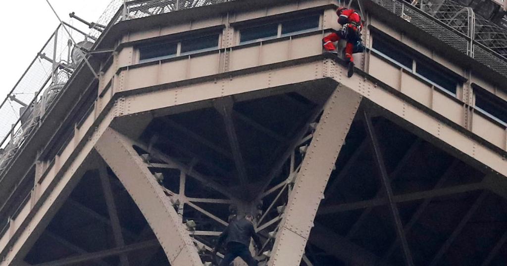 CBSNews's tweet photo. Eiffel Tower closes down after man scales the monument https://t.co/jUV1cyKvTk https://t.co/tRNM7s8Asp