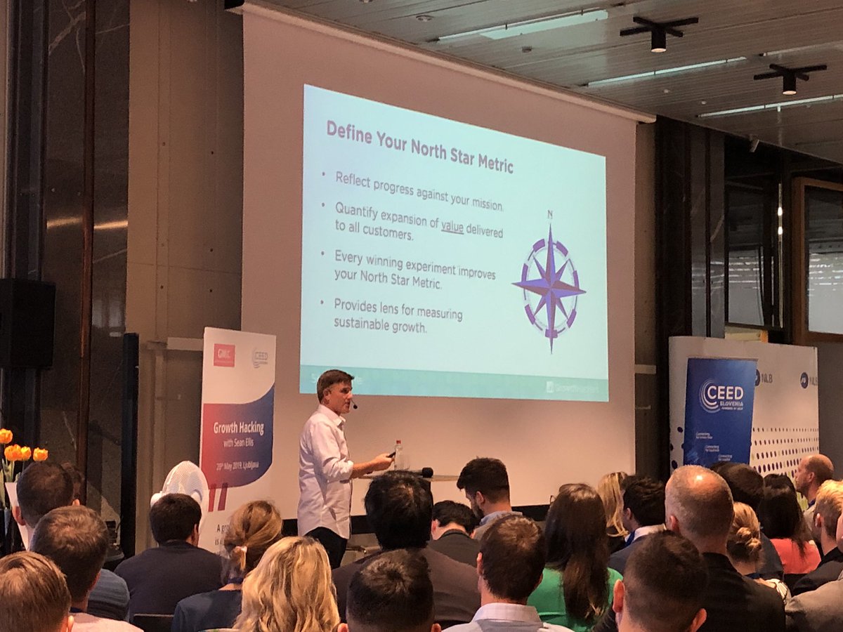 A growth hacker is a person whose true north is growth. <a href="/SeanEllis/">Sean Ellis</a> rocking our stage in Ljubljana. #seanellisceed