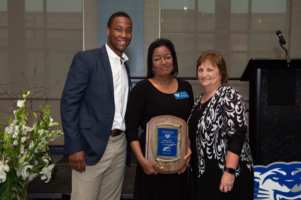 DoIt4Dandra's tweet photo. A huge honor for Dandra Thomas to be inducted in the inaugural class of the Wampus Cats Sports Hall of Fame. Pictured here: her mother Sandra Thomas and son Breylin Smith.  Thanks to @ibgolfen for speaking on her behalf and to @Fab44Tv for the special video footage @agentmariot https://t.co/2Vg6V8dB4Y