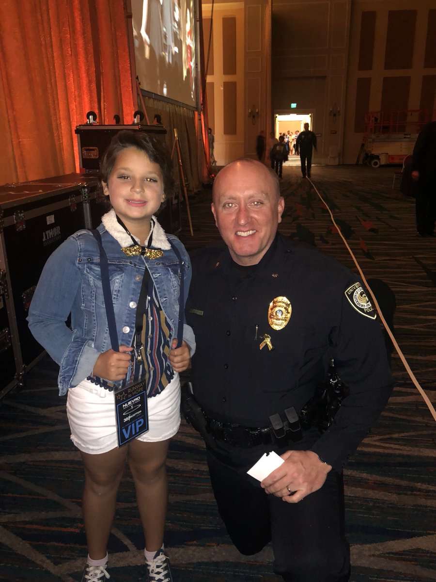 UCFPolice's tweet photo. On Saturday Commander Freeman and Detective Guadagnino had the honor of participating in @RunwayToHope, which raises support for an end to childhood cancer. They had the best time escorting these cancer warriors down the runway! #RunwayToHope https://t.co/6Qs4pnm9Ex