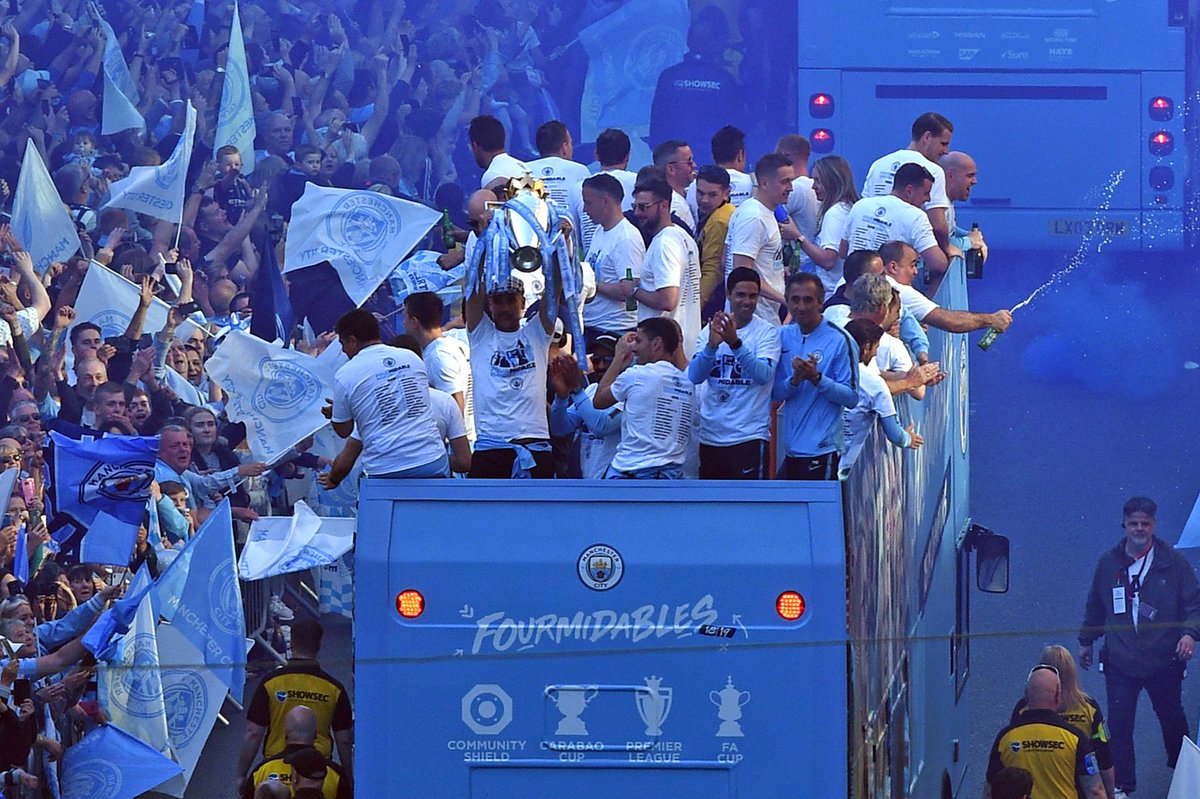 premierleague's tweet photo. A day that will live long in the memory for @ManCity and their fans 🏆 https://t.co/qveUBJiZ4Q
