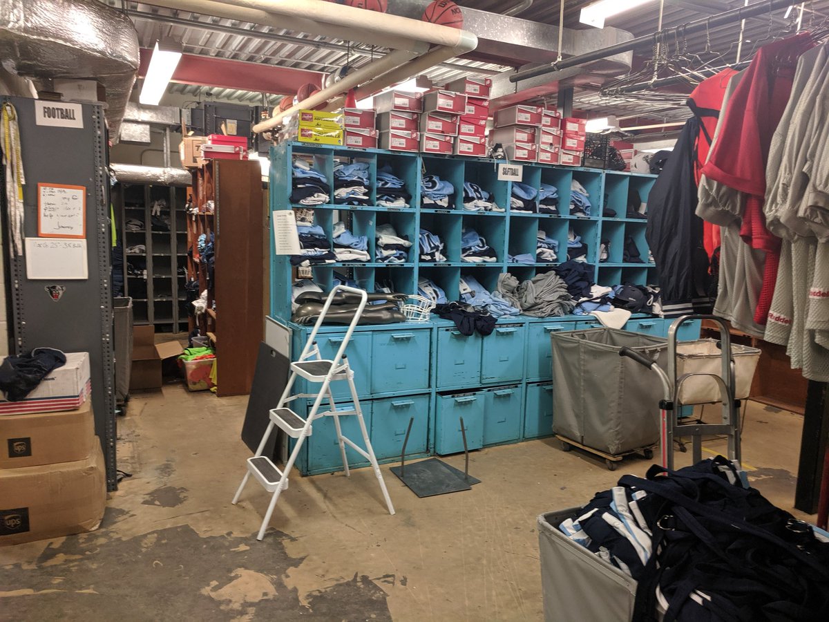 Maineritz's tweet photo. Before pictures as we start the process of clearing, renovating, and expanding the equipment room in Memorial Gym. Day one was dirty but we made some progress.
#nodowntime #equipmentmanagerproblems https://t.co/OKBQ31L0Lg