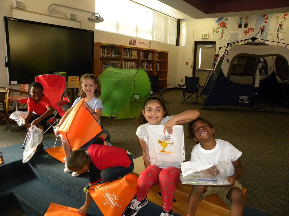mrsdrewscrew's tweet photo. This week we are "Camping Out with a Good Book!" HUGE shout out to @PEPGreenville for the AWESOME books for our students. We look forward to this day every year! The library looks amazing Mrs. Sanders! #wearedce #pepbooks @DCESdolphins https://t.co/2AbPDIBzxj