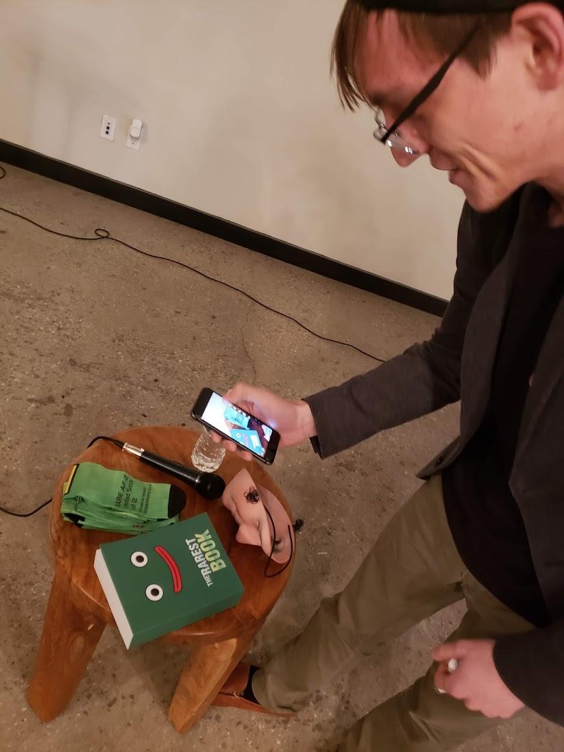 LevPo's tweet photo. The Rarest Book & Pepe socks being photographed by @troverman at #RAREAF2 @RareArtFest https://t.co/3yu22pWZ2F