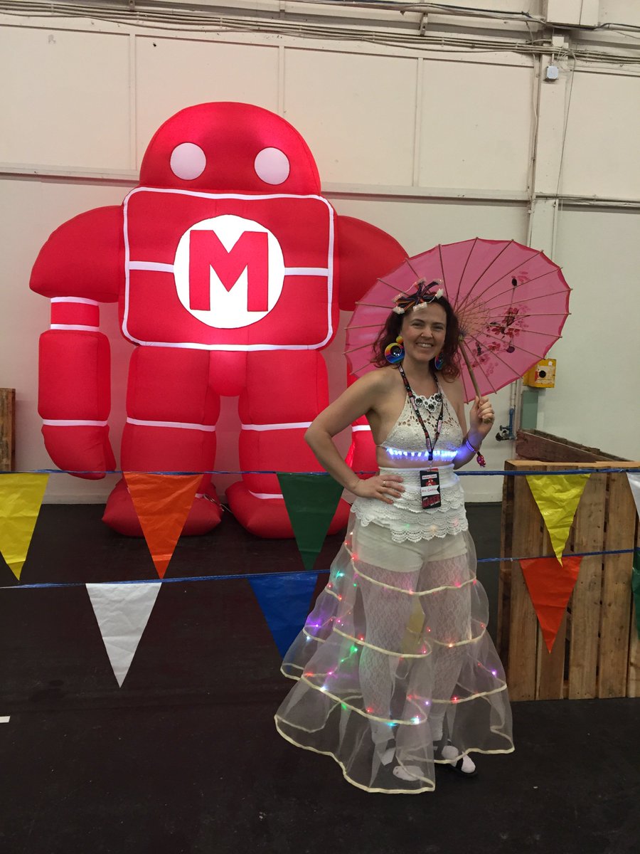 RogueMaking's tweet photo. @makerfaire Had SO much fun this year with my husband in the #darkroom at our #RogueMaking booth! Check out my photos #LEDweddingdress https://t.co/W8mZVF4LL6 https://t.co/JLuPrgILuR