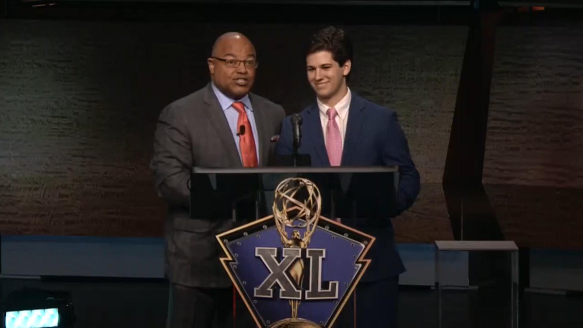 bhofheimer_espn's tweet photo. Remember the name @ethanzmiller. The Fort Mill, S.C. student was just awarded The Jim McKay Memorial Scholarship by @miketirico at #SportsEmmys. Very talented. Looks like he has a bright future in sports producing. https://t.co/OQMNtIXfsR