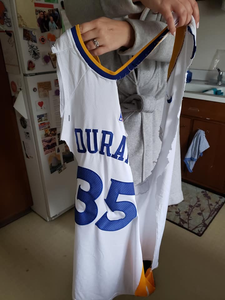 JaveBrave's tweet photo. I bought this jersey on ebay, this package has no return address, package was fine, yet inside was this. Contacted seller &amp; he wasn't remorseful, said I should feel special and appreciate what I have. Why are people terrible? #ebay #goldenstatewarriors #kevindurant https://t.co/hMqe1WA7X0