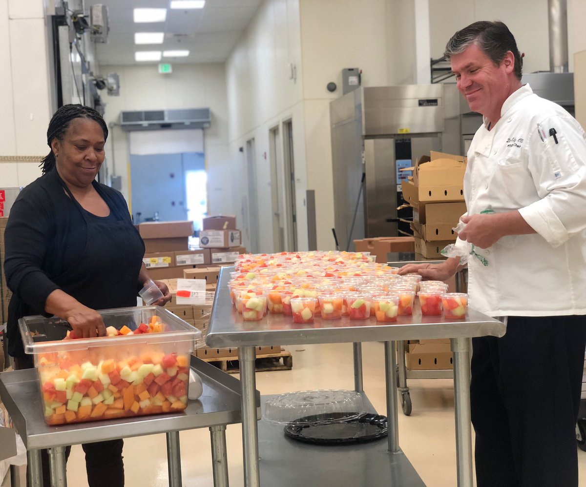 VinceCaguin's tweet photo. Various organizations and school districts gather at the #Natomas Central Kitchen to prepare food for the Picnic at the Capitol. #MillionMeals https://t.co/7pDwoBrwhQ