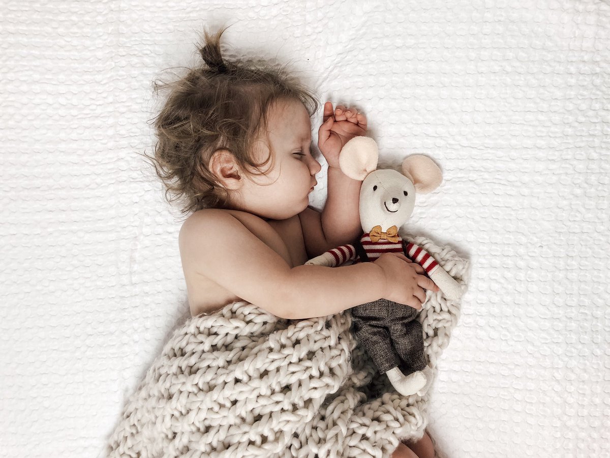 Sound asleep with his mousey 🐭❤️
