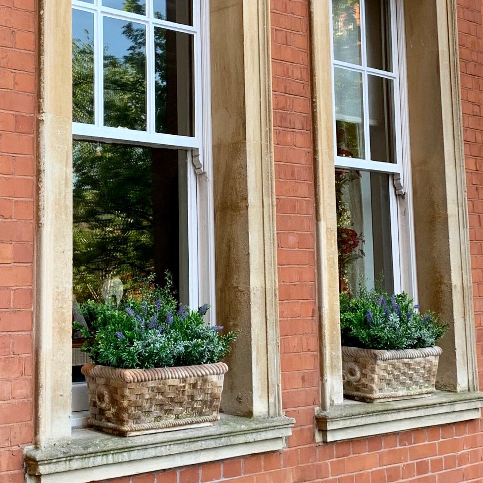 FakeItFlowers's tweet photo. A large beautiful London Victorian red brick home. We filled the client’s stone window troughs with a soft mix of artificial planting.  Permanent greenery for difficult to access areas. #londonbalconies #londongardens #londonhomes #fabulousfauxliage https://t.co/uBFpA6zc8o