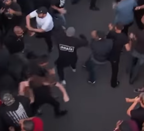 btherr18's tweet photo. 1:26 in the crowd on @JimmyKimmelLive's @slipknot performance, this dude throwing down in the pit.  You know somebody comes to fuck you up when they wear their @oasis shirt. https://t.co/jVeMD2tq6h