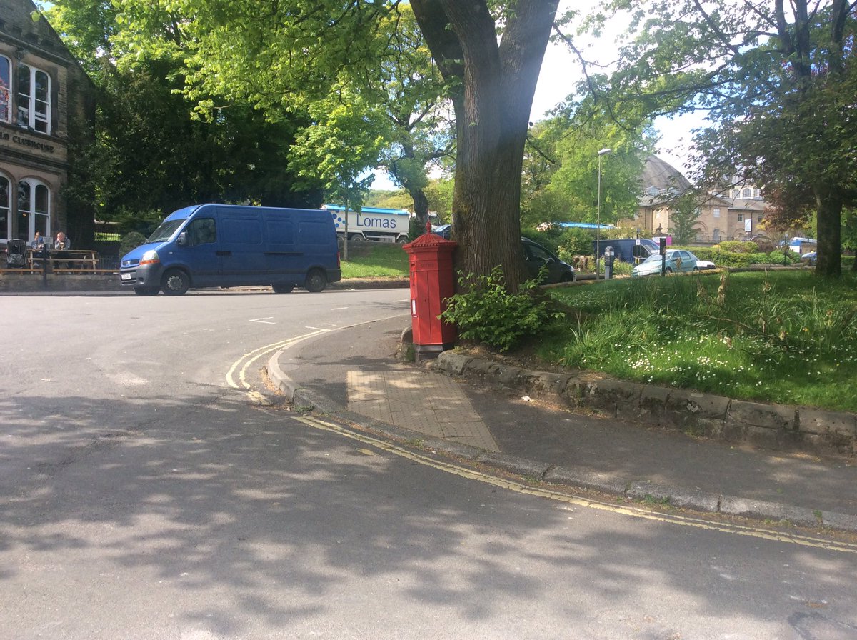 bordesleygreen1's tweet photo. Caught this Victorian example in Buxton yesterday, slowly being forced to lean with the growth of the tree behind. https://t.co/P0scyE1fgl