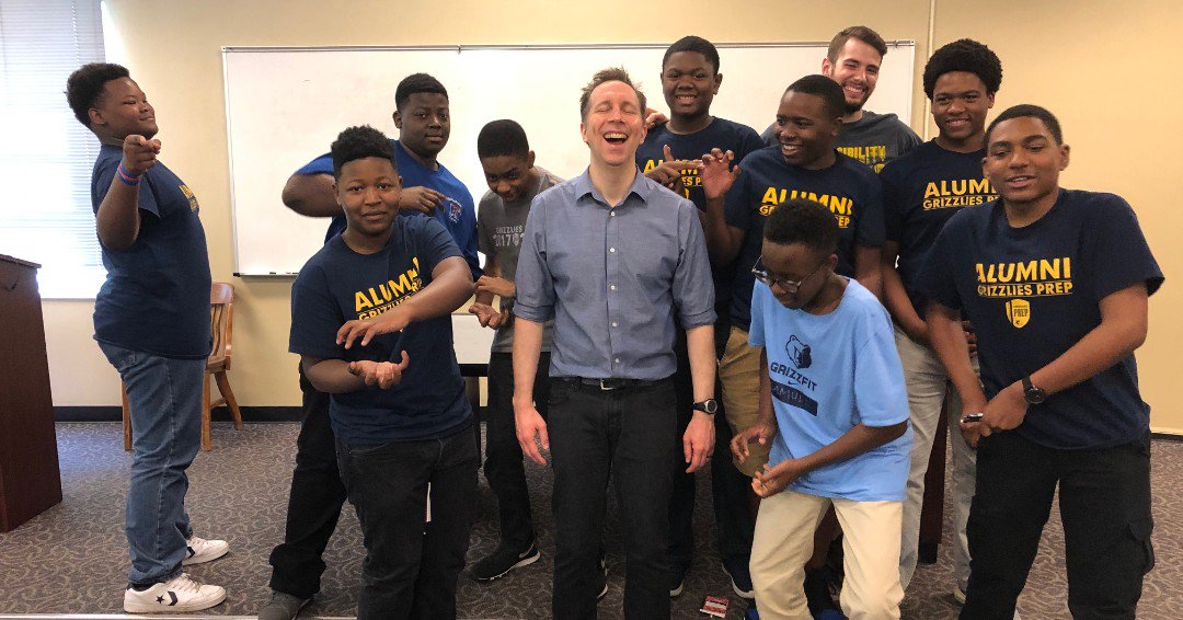 GrizzliesPrep's tweet photo. It's college trip week for #grizzliesprep 8th graders! First stop University of Georgia. Students visit with Dr. Pizzino an English professor who also teaches a class on animation and comics! Needless to say, he gathered a fan base. https://t.co/m5QoXKAwZs