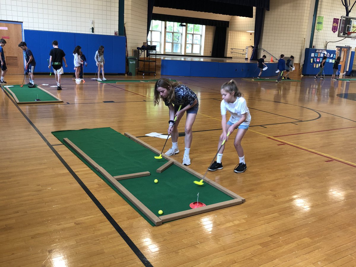 Deer Hill students are working hard on their short game of mini golf. Students are focusing on stance, grip and good golf edict.