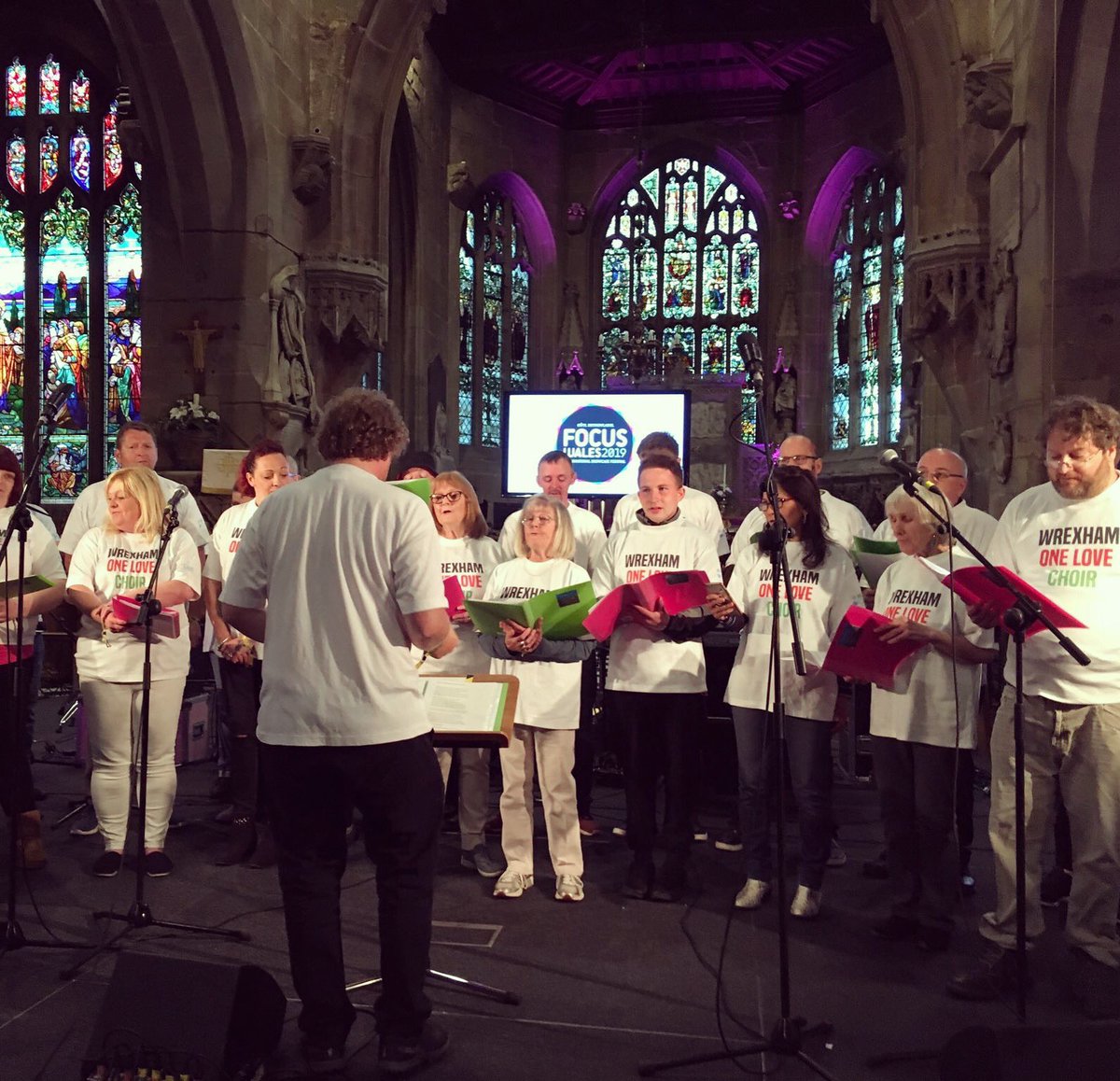 Such a fab picture of our choir on stage at @FocusWales on Saturday! We had a great time at @stgileswrexham - thanks to all those who joined us and support us!
