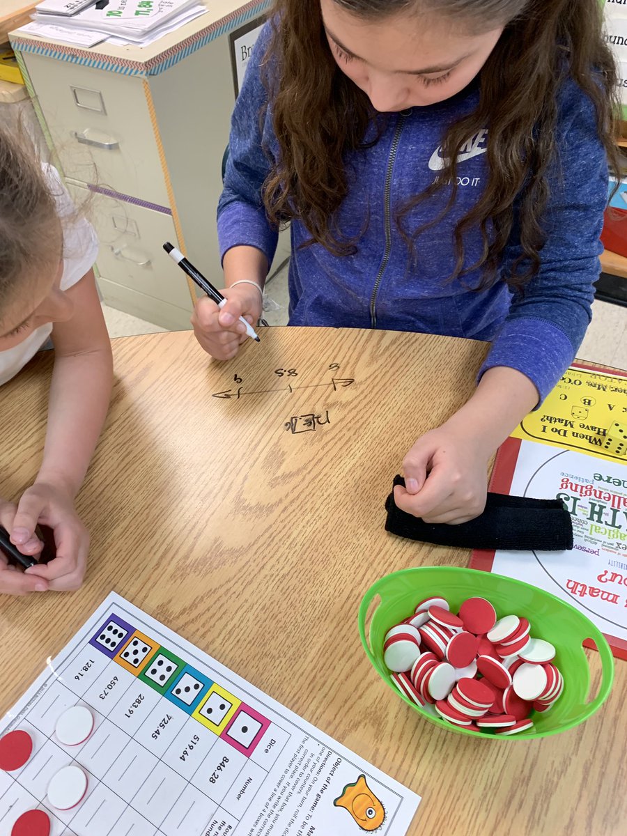 MathwithMrsOC's tweet photo. 5th graders @brewsterschools brush up on rounding decimal and whole numbers by boxing the number based on place value and using numberlines. https://t.co/rz47pgUekC