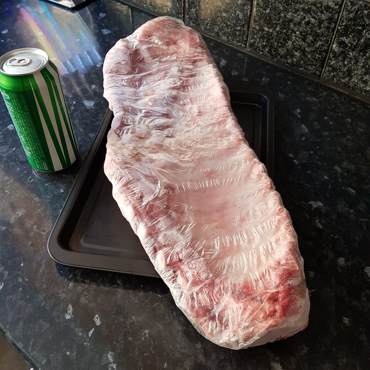 TheBarbequeChef's tweet photo. Ribs defrosting for Thursday cook. Can of larger for scale 😁🐖🐖🐖🐖 #BBQ #ribs #food https://t.co/Yw6O3hiJrS
