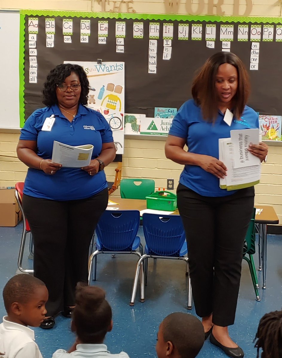 FLBlue's tweet image. Two employee volunteers at @DuvalSchools Smart Pope Elementary school @JANorthFlorida #JAinADay