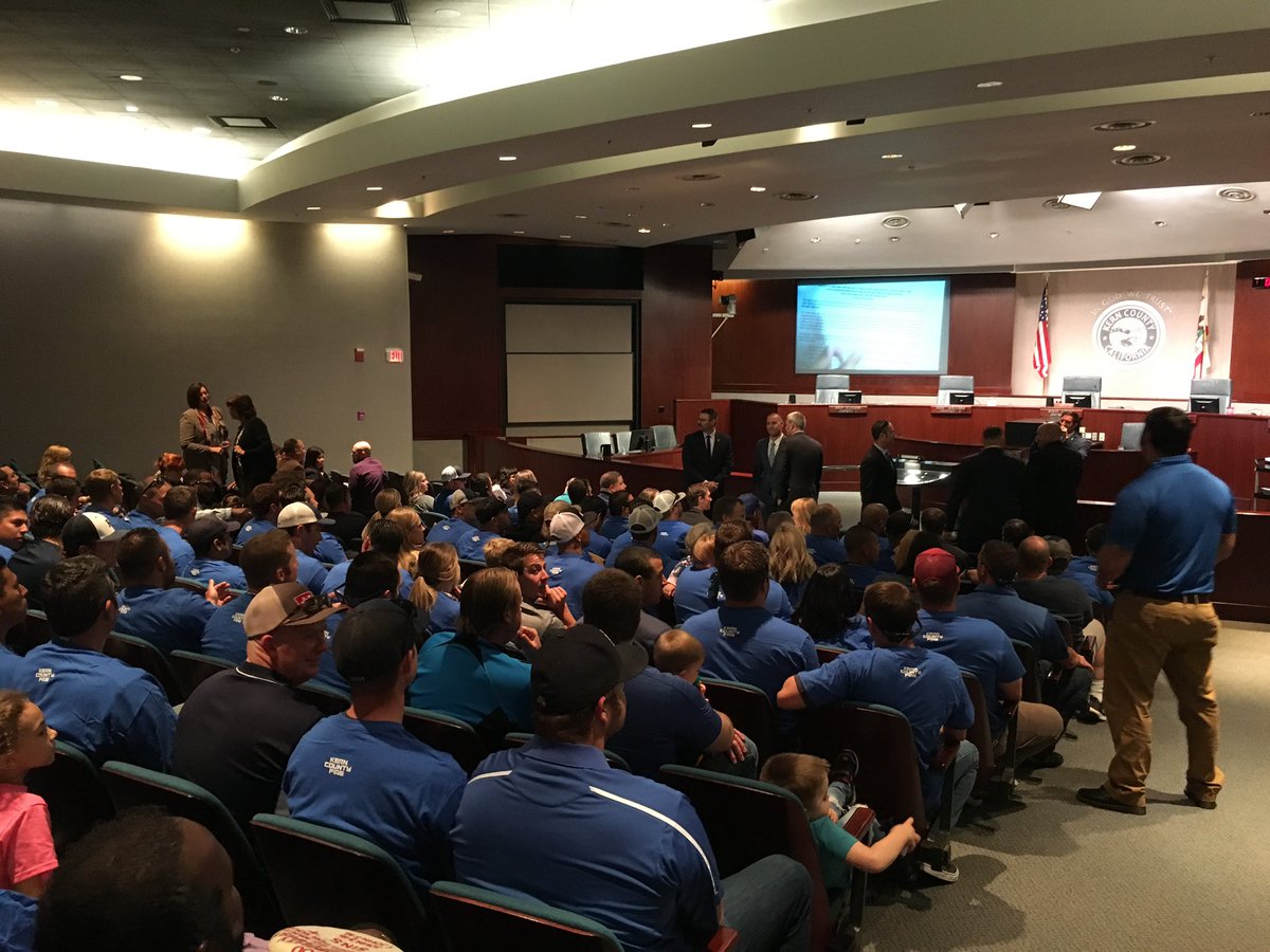 KCFF1301's tweet photo. #KernCountyFirefighters and their families show up to the BOS meeting to oppose a 9-15% loss in wages, which could be imposed by the county supervisors.  After 3 consecutive contracts with millions of dollars in savings to the county, #EnoughIsEnough! https://t.co/U6ClExNSr3