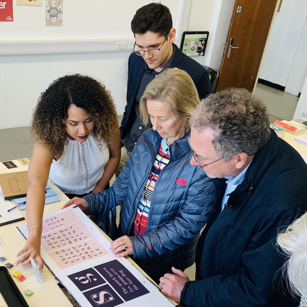 CoventryGD's tweet photo. Remember Vienna and Mihai, who jointly won the 2019 Graphic Design Student of the Year Award at last week’s SWATCH opening ceremony? Rob Hubbleday from @TheArtsSociety_ joined us today to give them their prize. Thanks, Rob, and thanks again to The Arts Society! 😊 https://t.co/7AneEMz0Cc