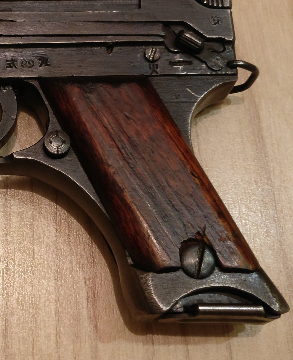 A final hallmark of late production is the fact that it has wooden grips instead of the earlier type of black bakelite. Debate still rages on Wikipedia as to whether they reverted back to bakelite in 1945 however I have never encountered such an example dated 1945.