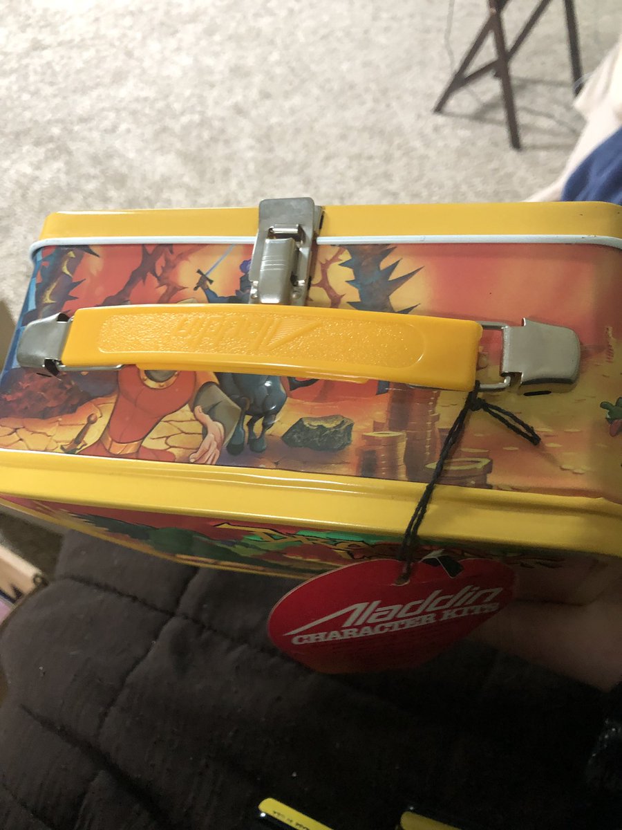 Veg_Gee's tweet photo. The things you find when unpacking. Remember the metal lunch boxes? This sucker is eBay bound. #dragonslair #laserdiscgames https://t.co/JHpVJz6kh3