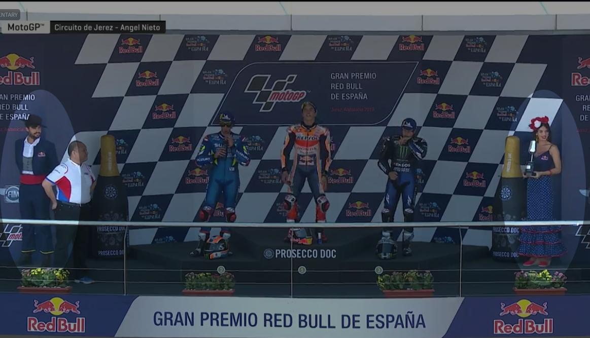 johnwromano's tweet photo. BRAVO to @MotoGP for the non-sexist winner's stage presenters at Jerez! Maybe next we can give the umbrella holders some reasonable clothing? https://t.co/7a8AaMCGgg