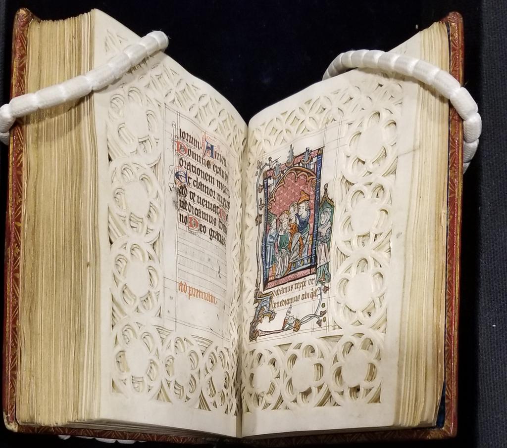 MedievalMss's tweet photo. Here's an unusual 14th c. French manuscript (W.93) with margins cut like lace! Known as canivet, this method is often associated with much later periods, but this text/image layout suggests maybe the margins were planned this way. Anyone know of contemporary examples? https://t.co/OHAT0HAPYJ