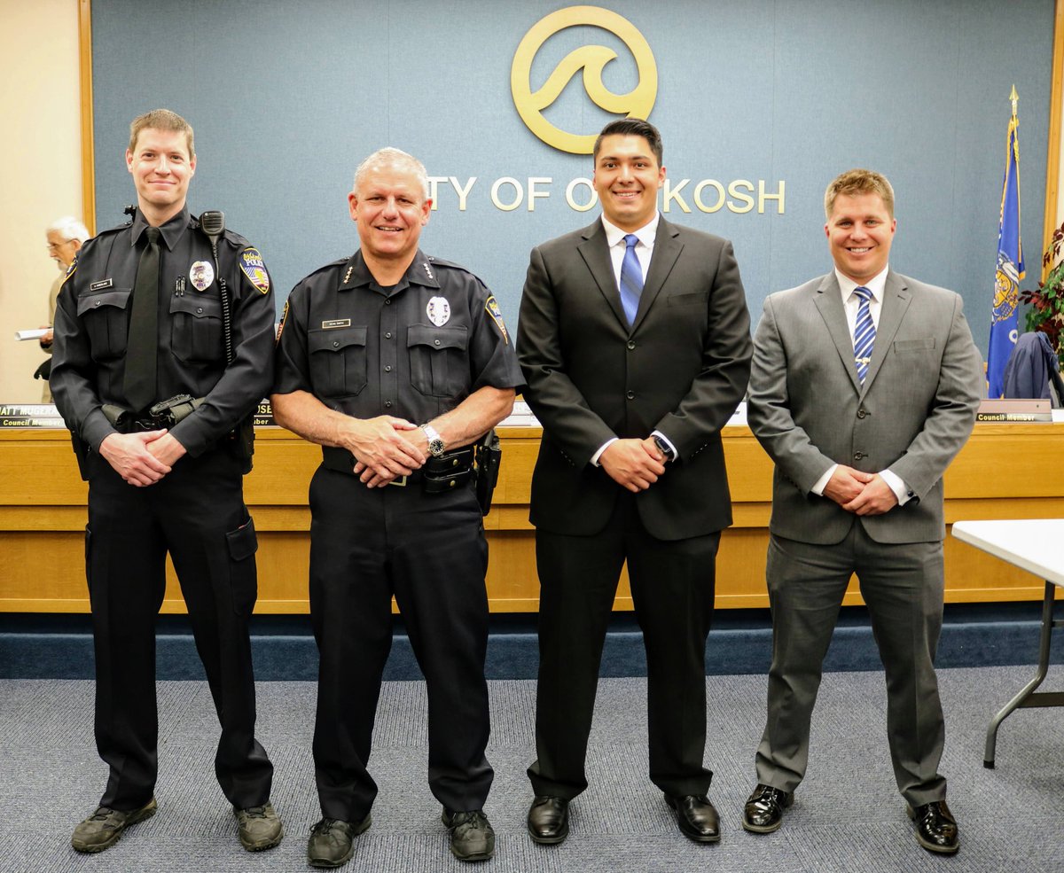 oshkoshpd's tweet photo. During a Police &amp; Fire Commission meeting today, the Oshkosh Police Department celebrated the promotion of Officer Adam Haberland to the rank of Patrol Sergeant and welcomed new Police Officers Stephen Schuldes and Miguel (Angel) Nunez to the OPD Team! CONGRATULATIONS! https://t.co/S0a76ygla5