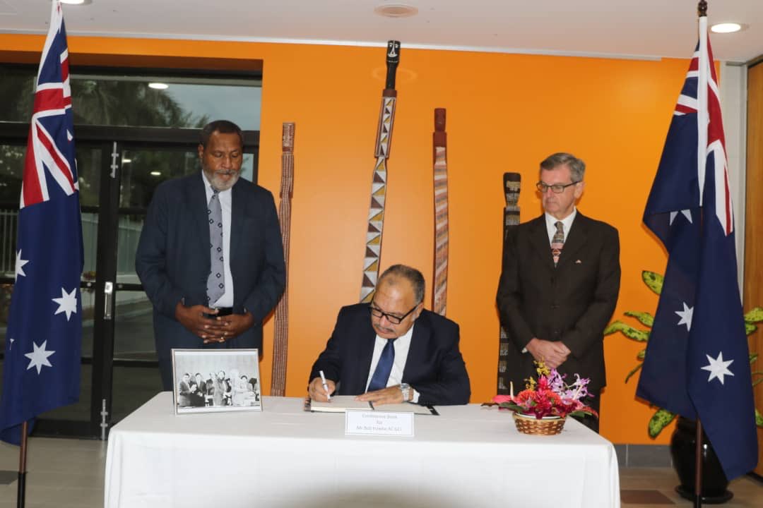 pm_nec's tweet photo. Prime Minister O’Neill’s signing a condolence message to the Family of late former Australian PM Bob Hawke, which read:

"Our nation's sympathy to the family and people of Australia on the passing of a great friend of Papua New Guinea the late Bob Hawke.” https://t.co/rMP4IGGxWW
