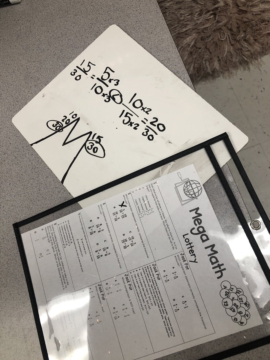 Rigor + engagement 😍 Students working hard during our Mega Math Lottery. Easy prep: Students solve a problem, if they get it right they get to write their initials on a number. We draw at the end for prizes (simple as dojo points). #iteachmath #iteach4th