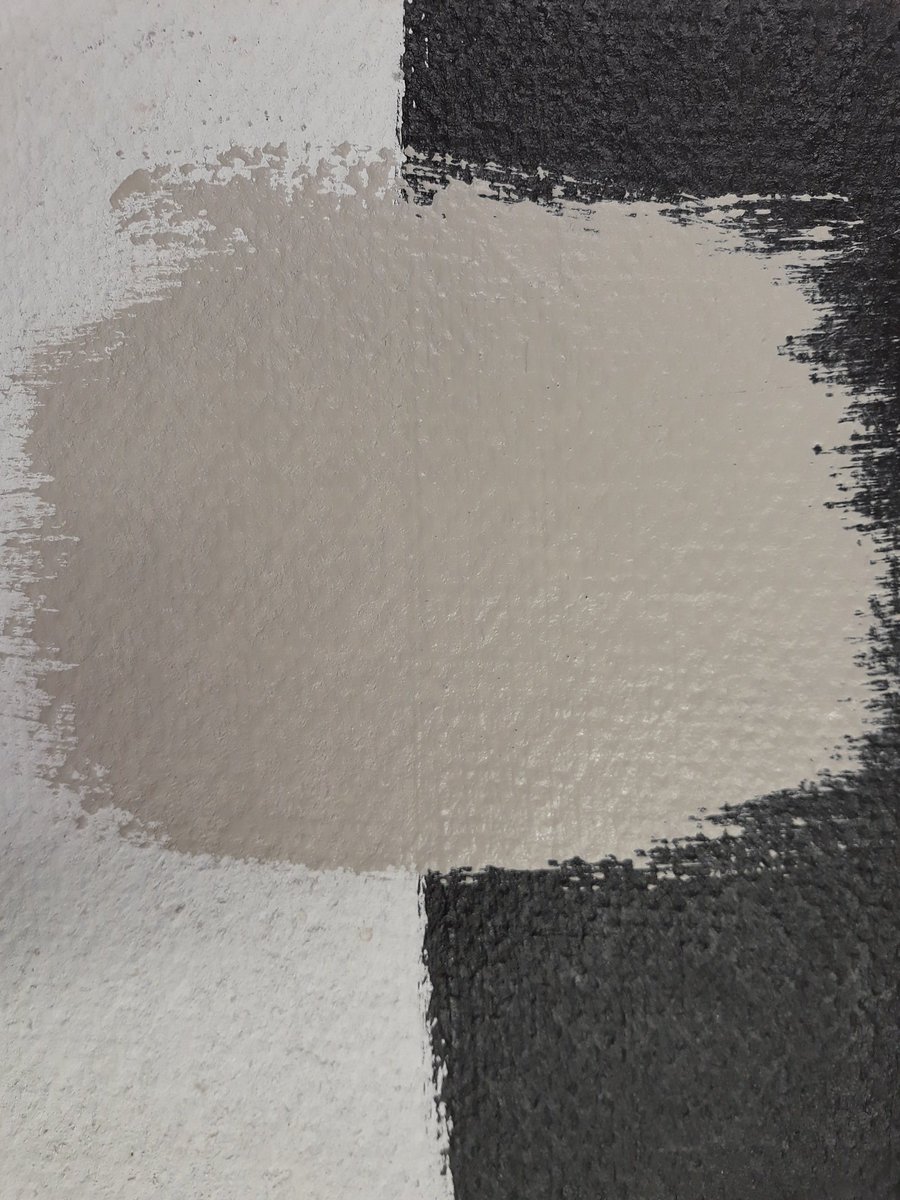 All paints are not created equal. Benjamin_Moore Aura offers incredible hide over dark colors. Here is one coat of interior satin Aura over black and white. Investing in a great quality paint reduces labor and material costs! #paint #wallpaint