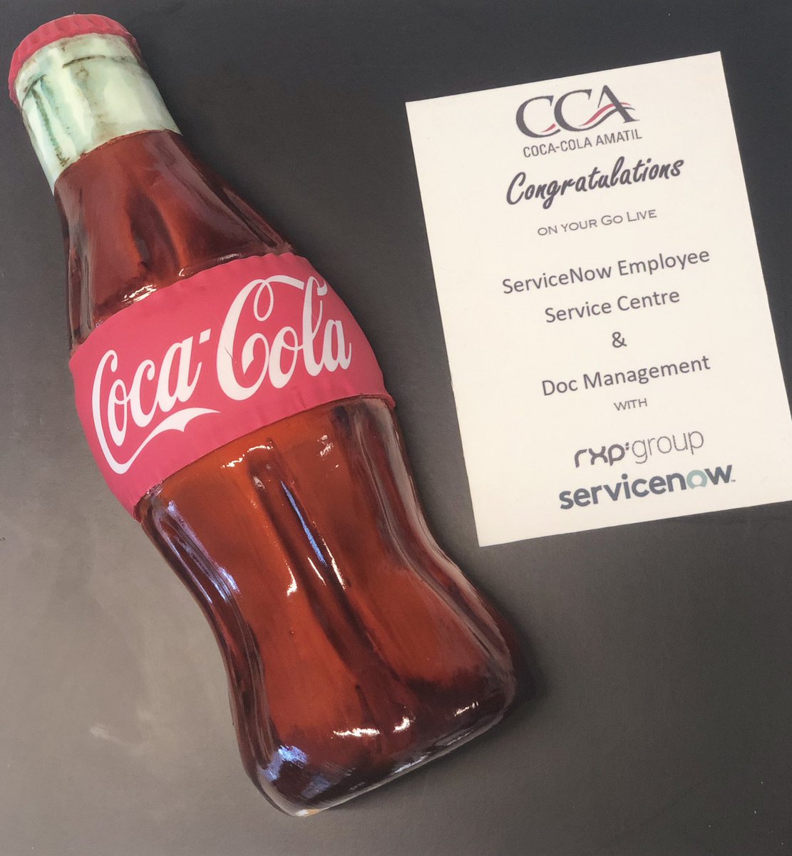MarkSouterLive's tweet photo. Congratulations @CocaColaAmatil on your #HR @ServiceNowANZ go live #cake 🧁 Thanks to @rxpservices for the implementation service. #HRtech #ServiceNow #EasyForEmployees #Coke #CocaCola https://t.co/Mob91BNlNk