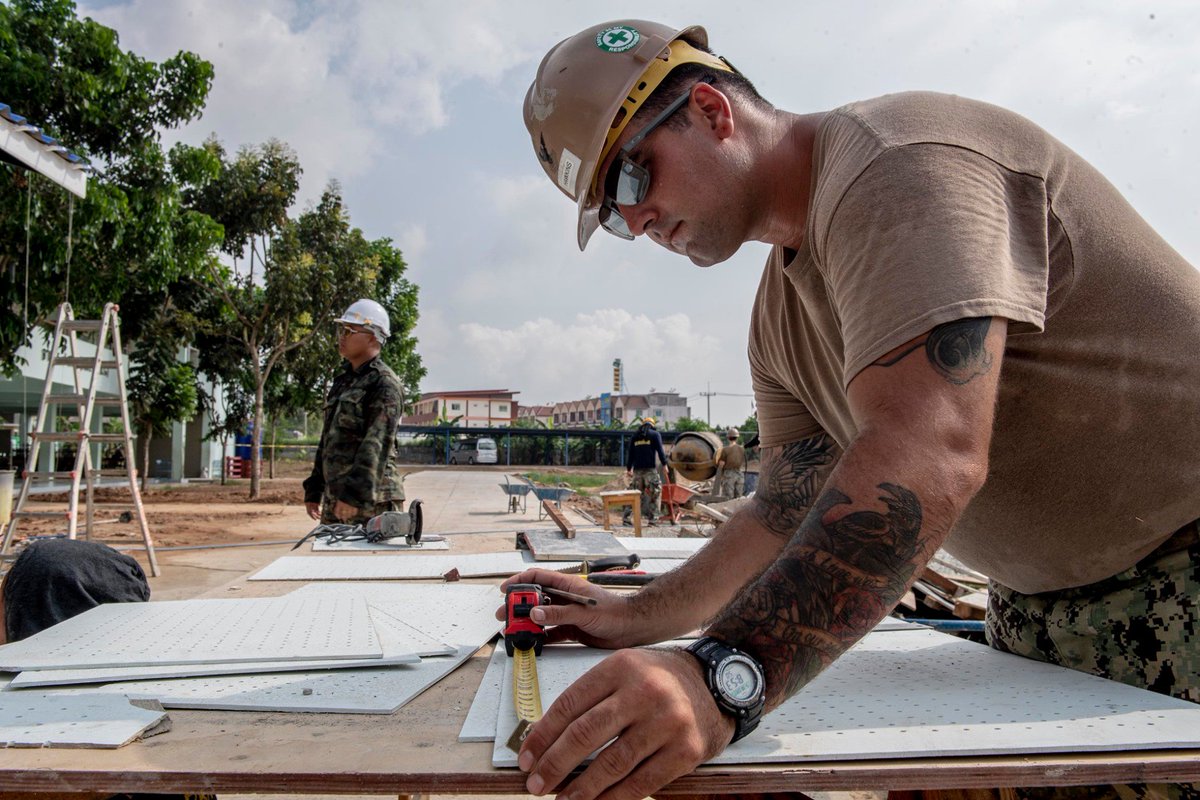 USPacificFleet's tweet photo. #USNavy Seabees from Naval Mobile Construction Battalion #NMCB4 work with Thai counterparts to build a library/disaster relief shelter during the ongoing #PacificPartnership2019 mission in Chonburi, Thailand. https://t.co/PCr0d8M3cu