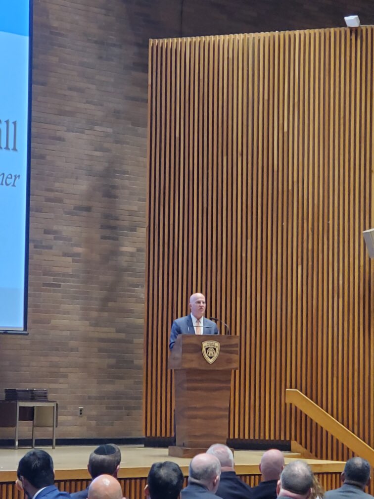 Commissioner O’Neill making a speech at police headquarters.