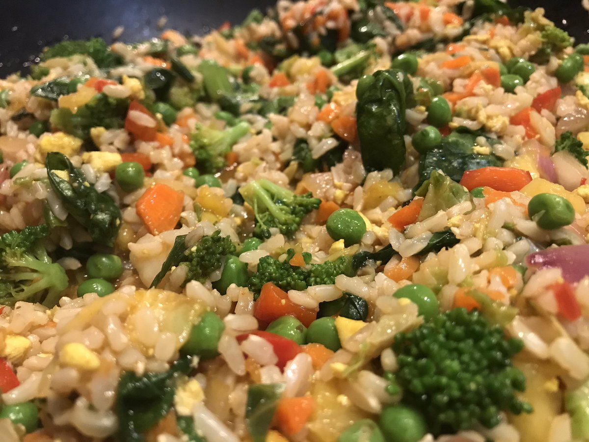 For this dish, I made teriyaki sauce & then stir fried Brussels sprouts, carrots, red onions, broccoli, peas, red peppers, spinach, onions, garlic, ginger, tofu scramble and pineapple