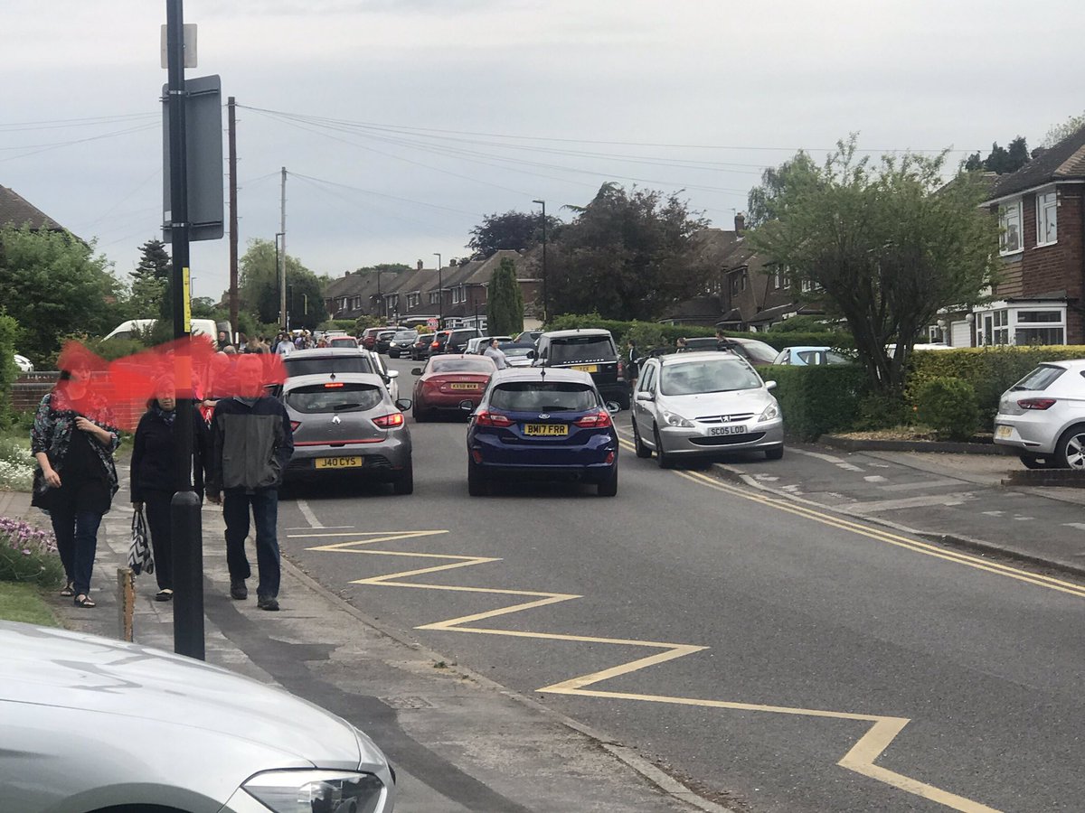 Ms_J_Harrison's tweet photo. All the way up Cotysmore. Took these parents less than a week after @WMPolice @STrinityWMP came to revert back to #dangerousparking What is wrong with people? There are plenty of spaces a short walk from school. https://t.co/eBcOktpdKu