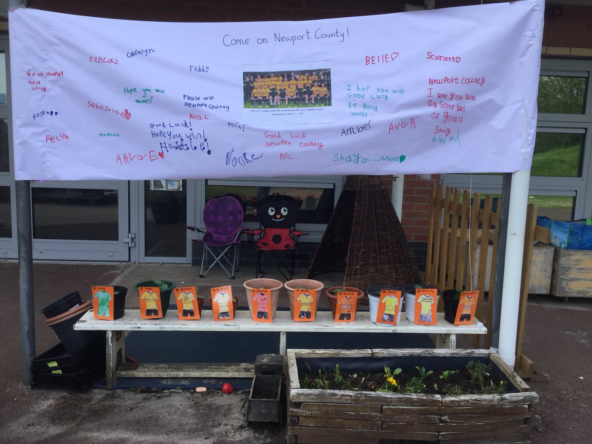 Yr1GUPS's tweet photo. Class 1C are supporting Newport County AFC this weekend! Evan’s grandad donated sunflowers to the class and Evan wanted to name them after some County players. They had fun making the labels and Good Luck banner. UTC! @Yr1GUPS #GUPSCom #GUPS #NewportCountyAFC https://t.co/BrMStq4m2s