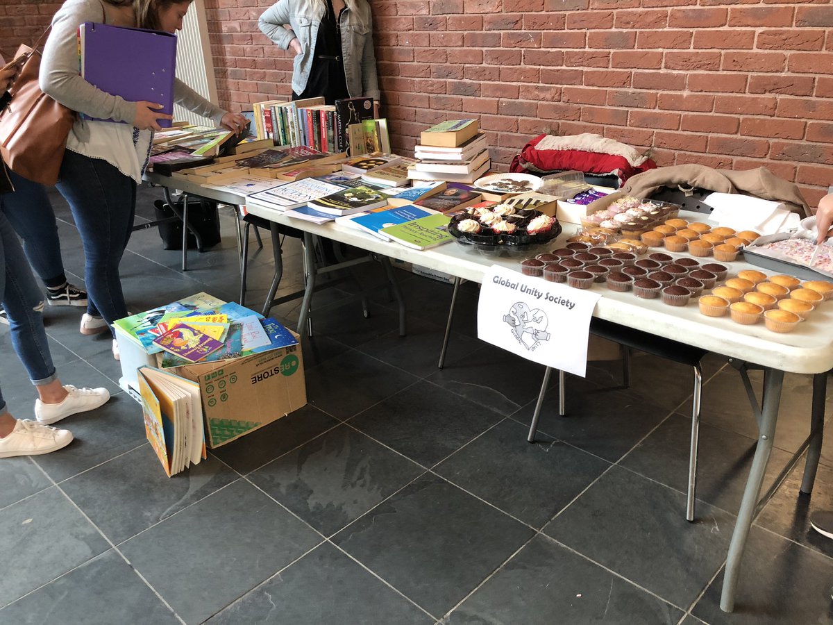 Mrs___Khan's tweet photo. Cake/book sale in @EHU_FOE lots of good children’s books as well as academic books for your assignments!! All donations welcome! https://t.co/FzxV6zdiCc