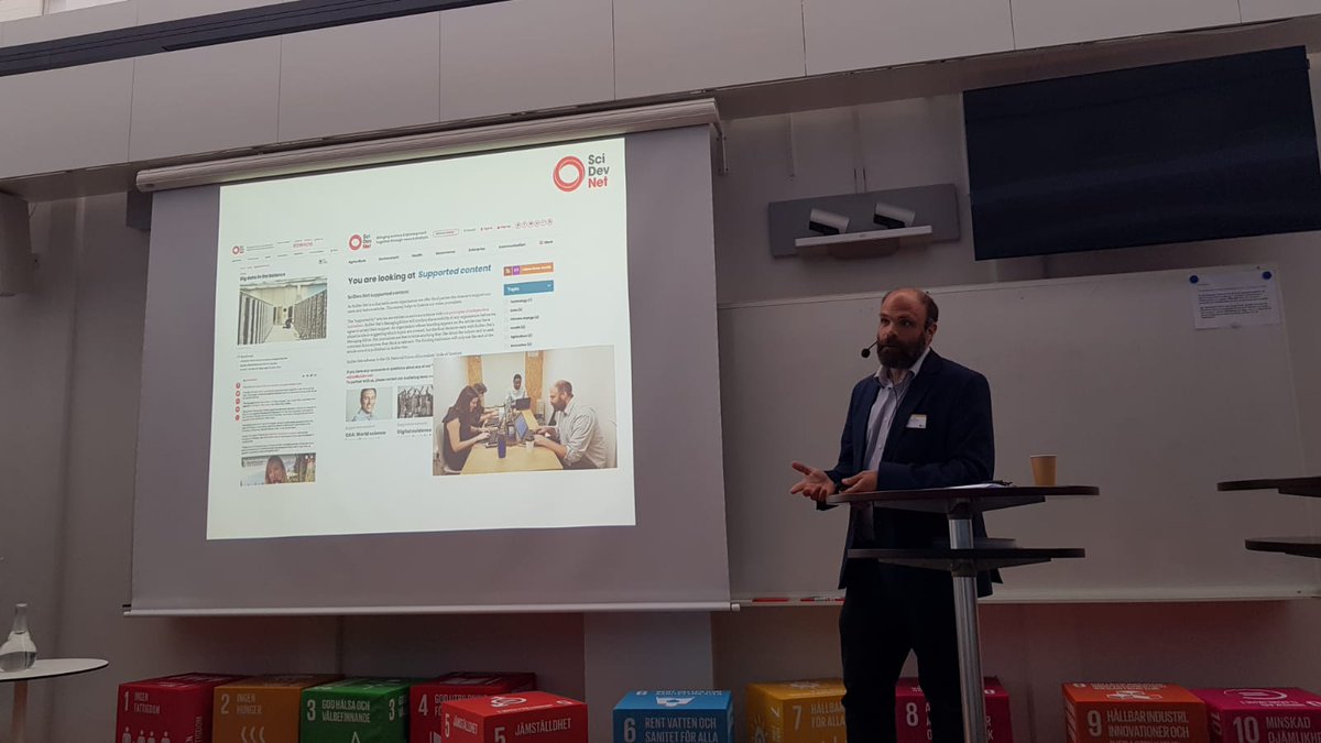 SciDevNet's tweet photo. At #SidaScienceDays2019, our team: @posy76 (B. Osama), @drwendo (Dr. C. Wendo) and @ben_deighton (Ben Deighton), explained how you can benefit from our @ScriptTraining that enhances #communication for institutions and researchers. https://t.co/BXoms3cnLV https://t.co/Ae6waDG51E