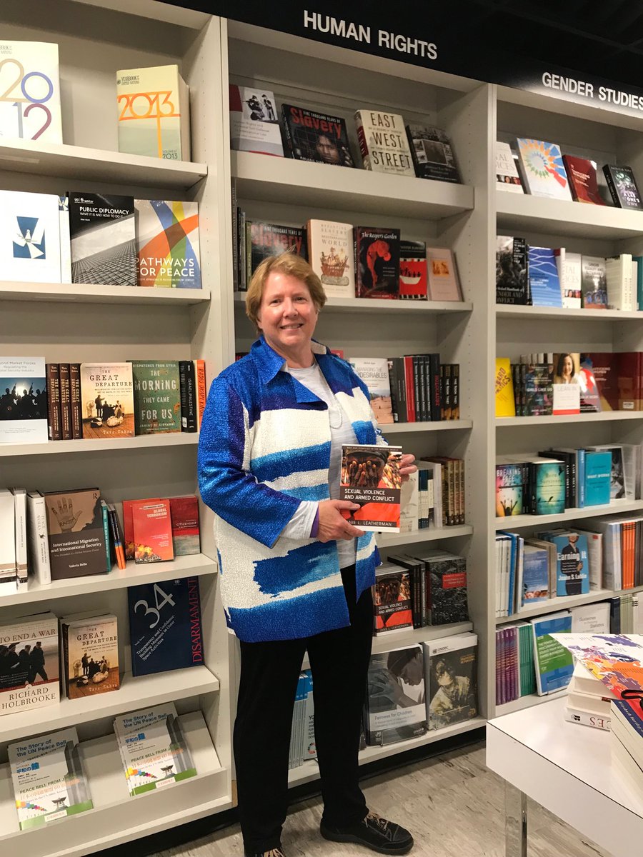 FairfieldCSI's tweet image. Janie with her book in the UN BOOK STORE!