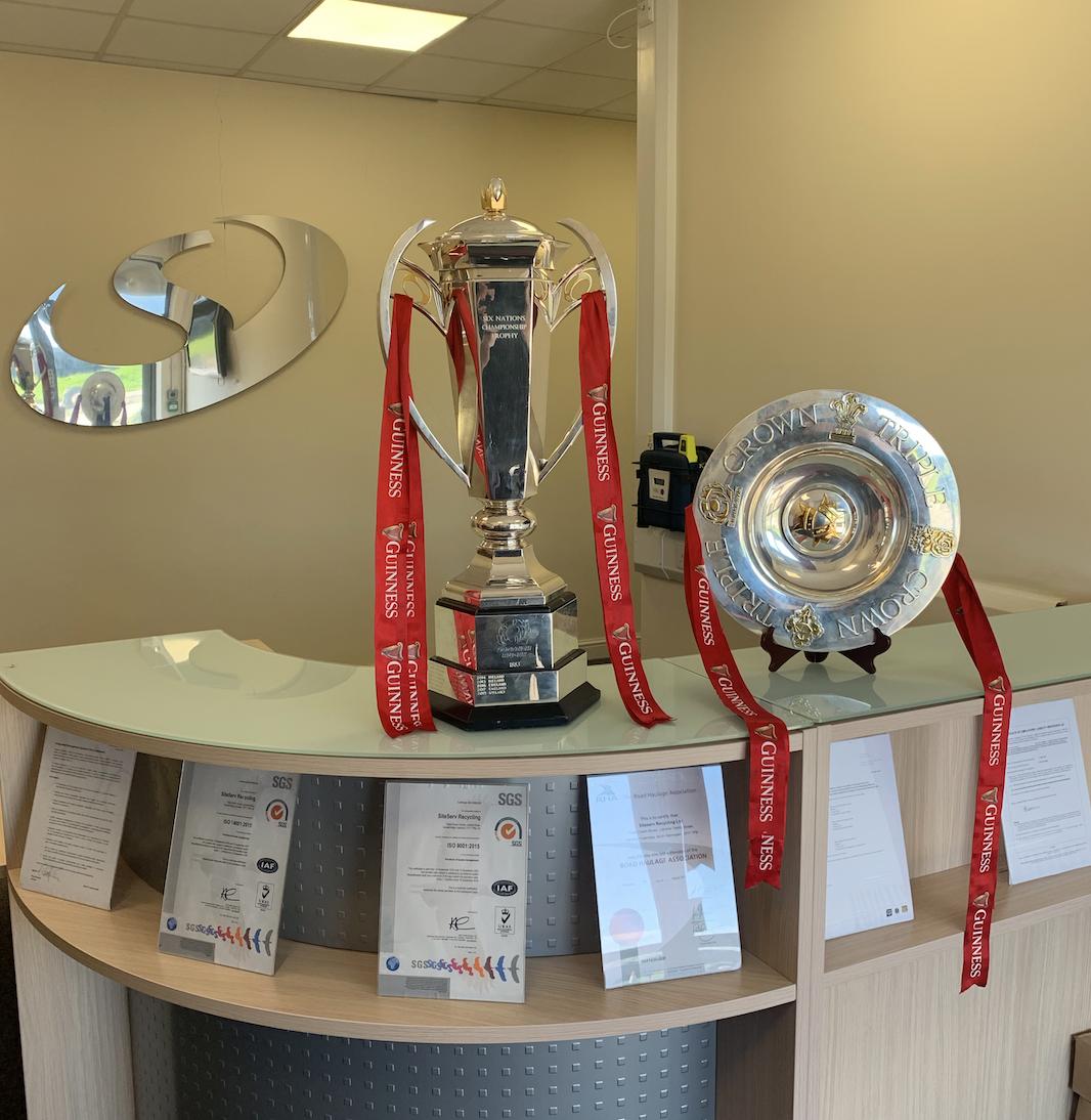 Siteserv's tweet photo. We had some rather shiny visitors in the office yesterday. What an honour to host such a special pair of trophies for the morning. The @SixNationsRugby Triple Crown at our very own HQ, Triple Crown House. https://t.co/jAPItoSgNK