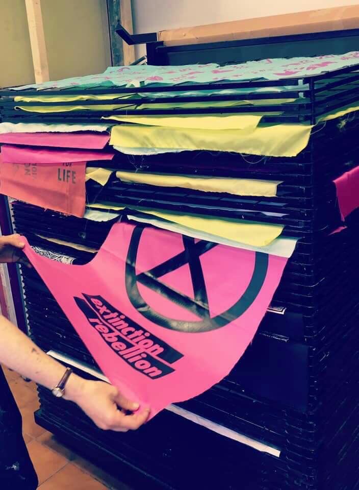 NorwichXr's tweet photo. The Norwich XR Arts Team have been busy doing some printing, creating lovely artwork ready to hit the streets to raise awareness of #ClimateCrisis and ecological emergency. Let’s make change happen! #ConscientiousProtector #RebelForLife #ExtinctionRebellion https://t.co/KZceiL09VO