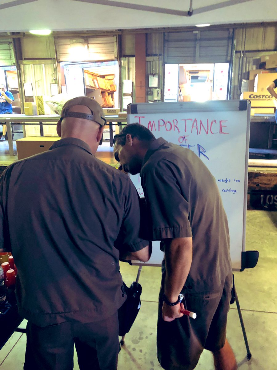 NaplesSafety's tweet photo. Wellness Wednesday! Wellness Champ Sean Grant discussing nutritional information with a driver while setting up our wellness display! Electrolytes are great bet water is best! #safetysquad239 #fldistsafety #wellnesswednesday @UPStempe @Phil8Santana https://t.co/RnHEGOAoOV